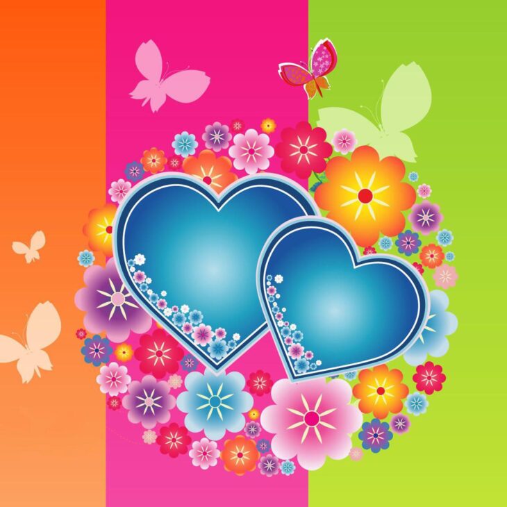 Два влюбленных сердца на фоне цветущих цветов и бабочек – романтический дизайн для открыток на День святого Валентина.