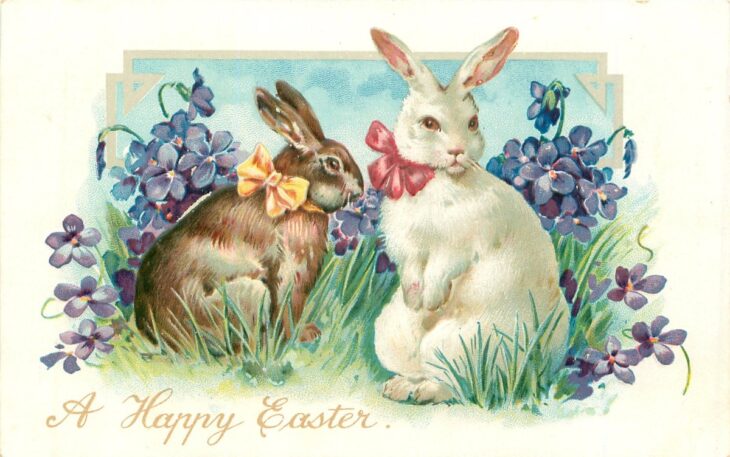 пасхальная открытка с кроликами и цветами