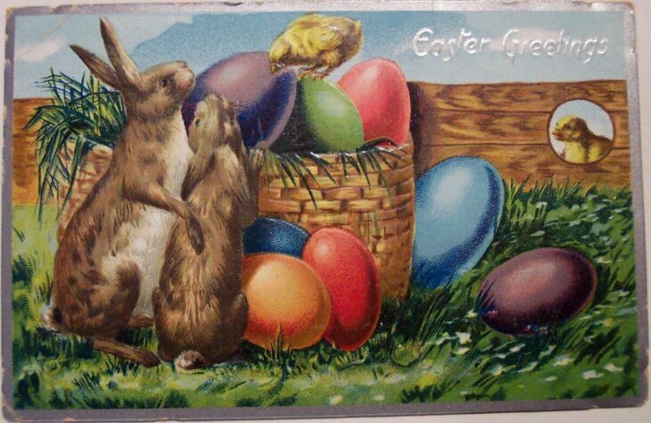 пасхальная открытка с кроликами и яйцами