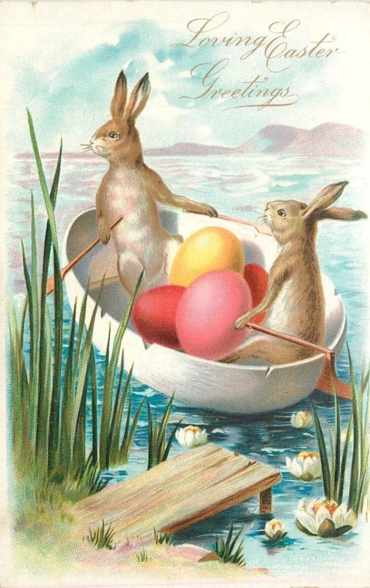 Пасхальные кролики с яйцами на лодке с поздравлением