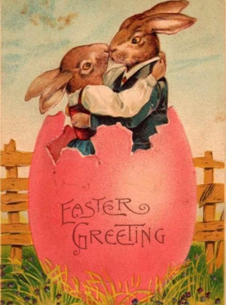 Винтажная пасхальная открытка с кроликами и яйцом